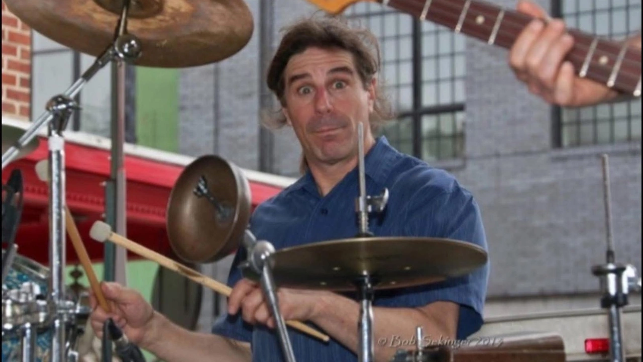 A drummer plays outdoors