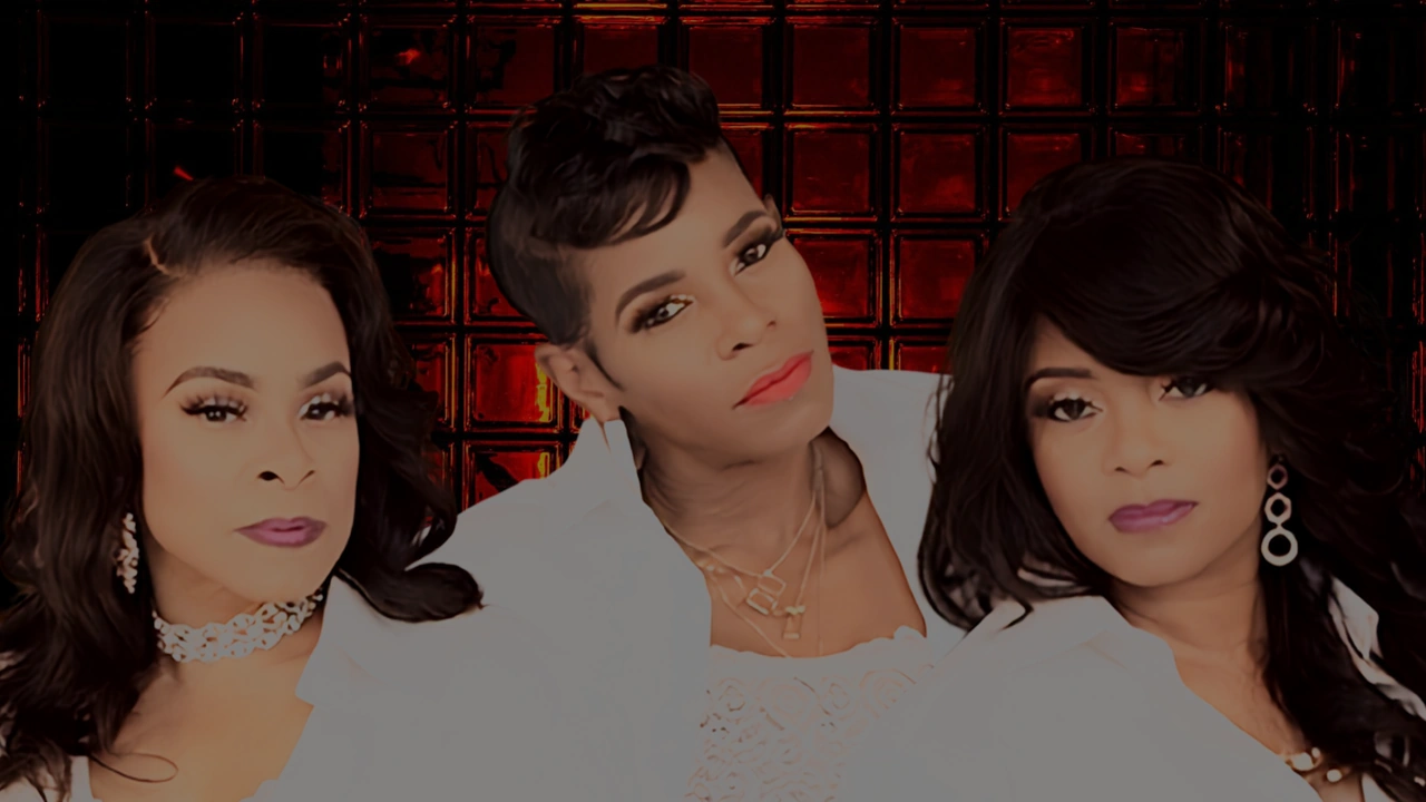 Three women singers pose together