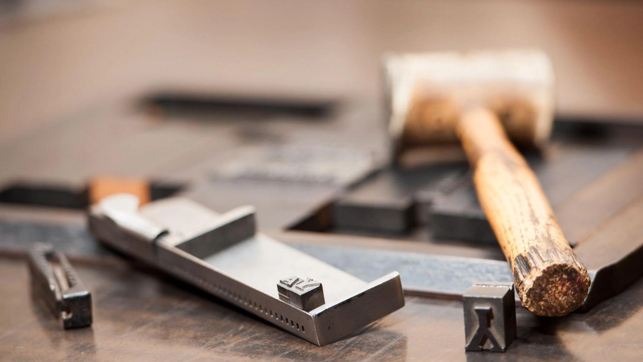 Old metal tools resting on a workbench