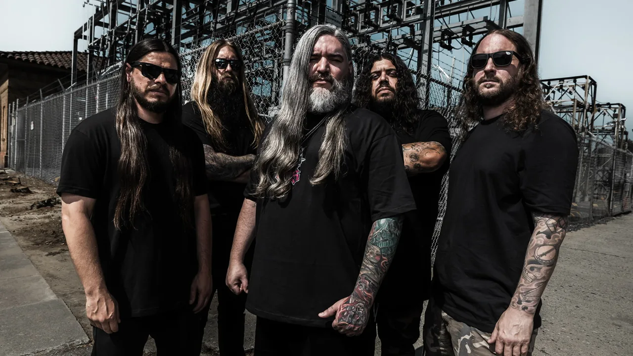 A heavy metal band poses outdoors