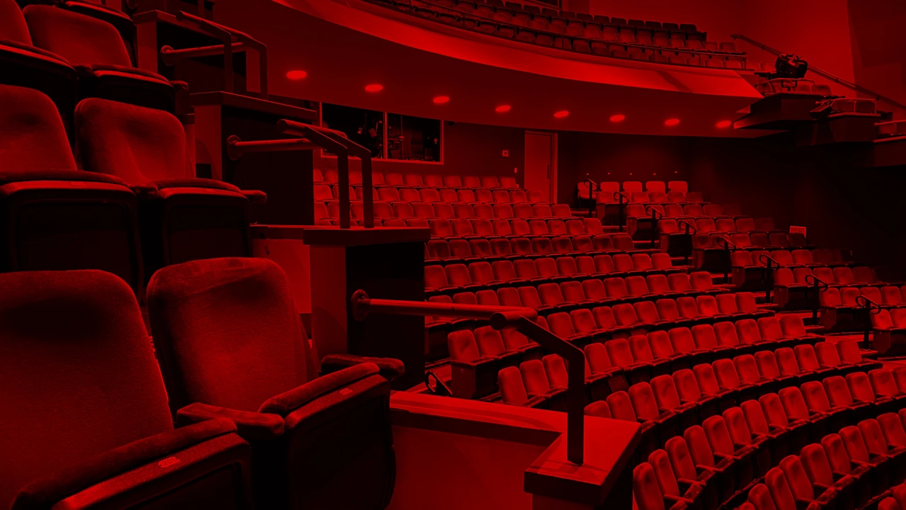 Rows of red theater seats