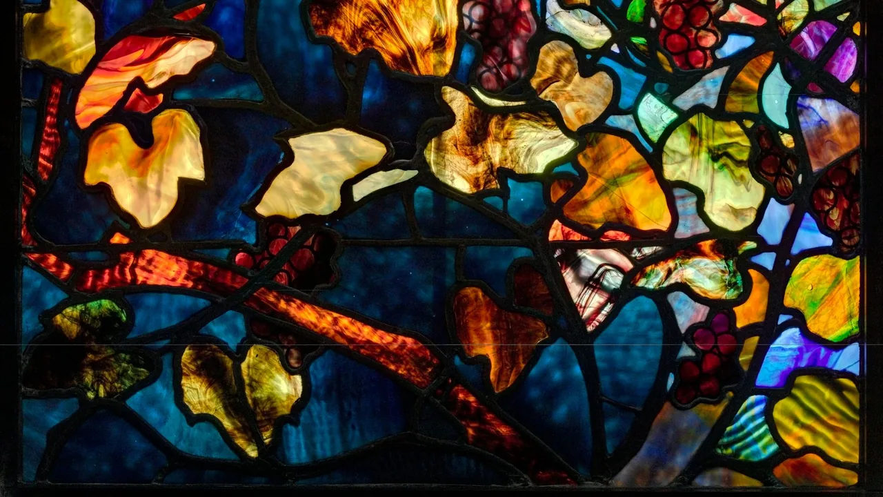 Colorful stained glass with autumn leaves