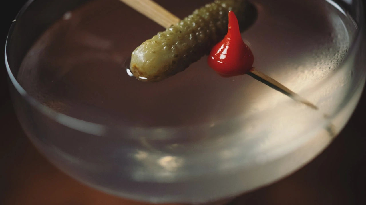A martini garnished with a pickle