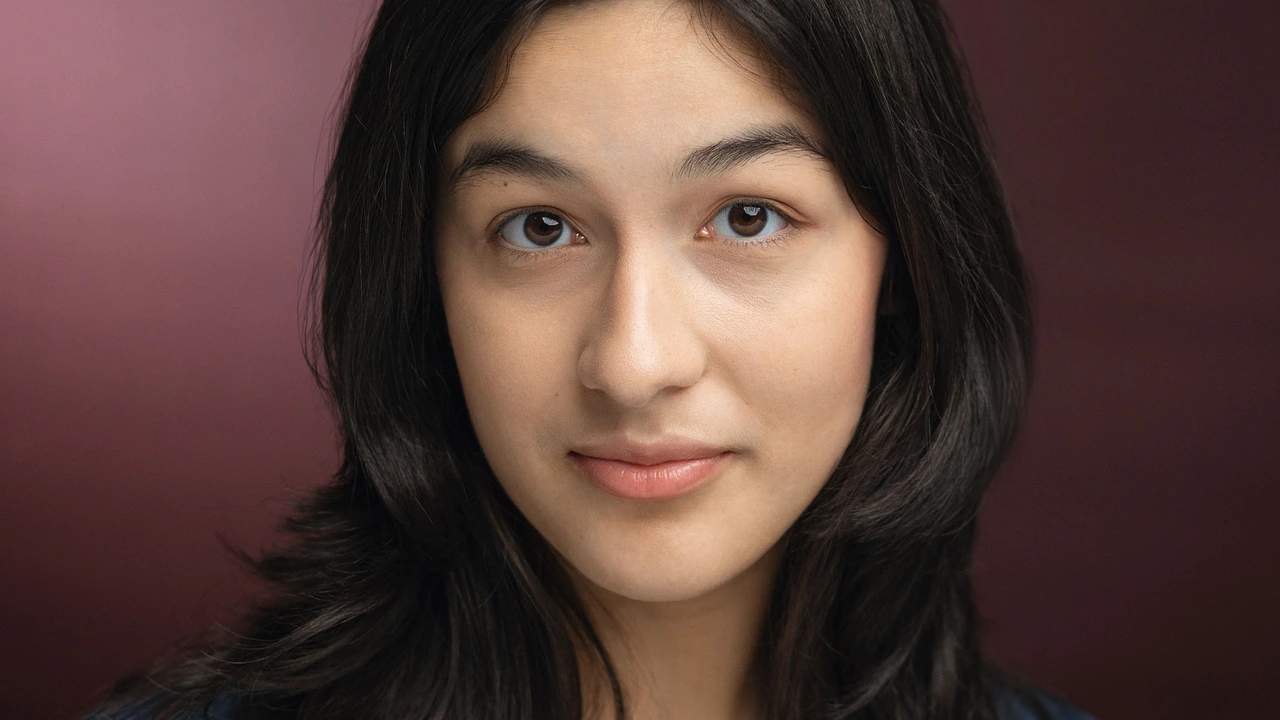 A portrait of a young woman with dark hair