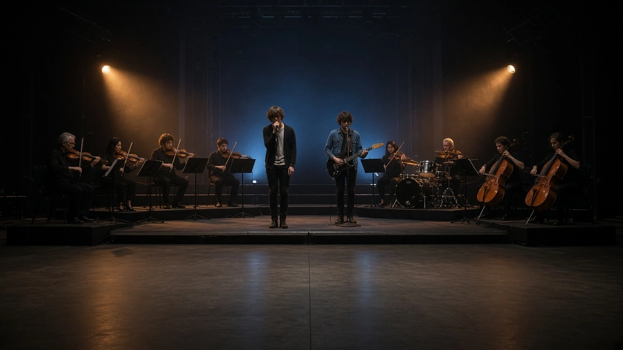 A small orchestra playing on a dark stage under blue light.