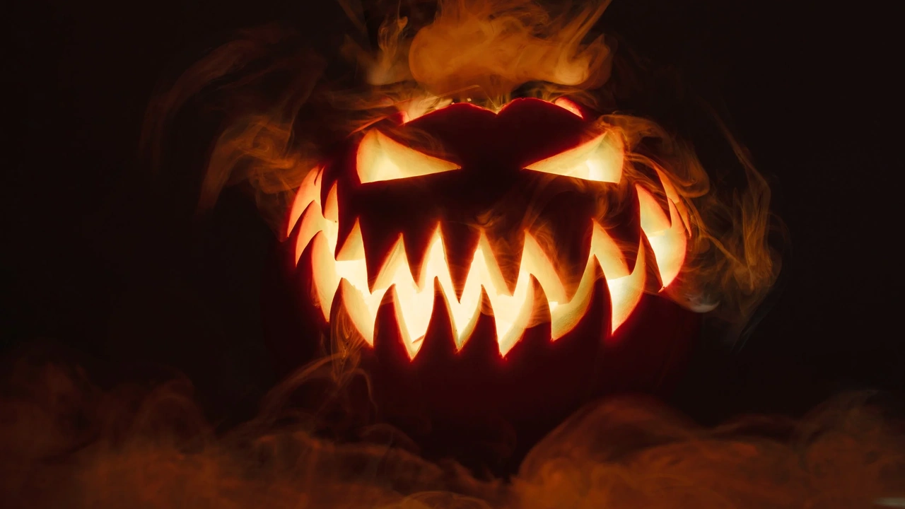 A carved jack-o'-lantern glows with a jagged grin